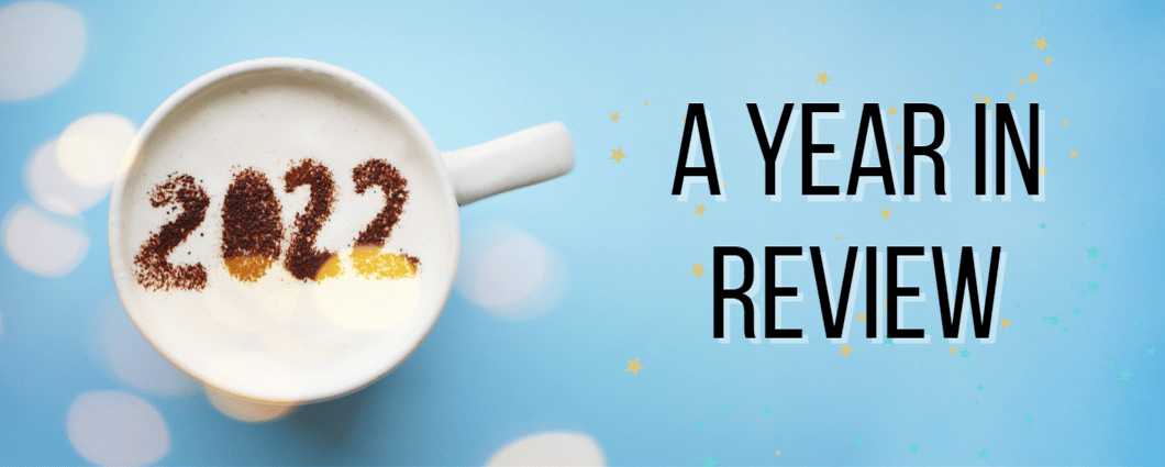 coffee cup with 2022 written in frothed milk and headline A Year In Review